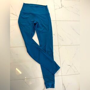 Lululemon Align high rise turquoise leggings.
